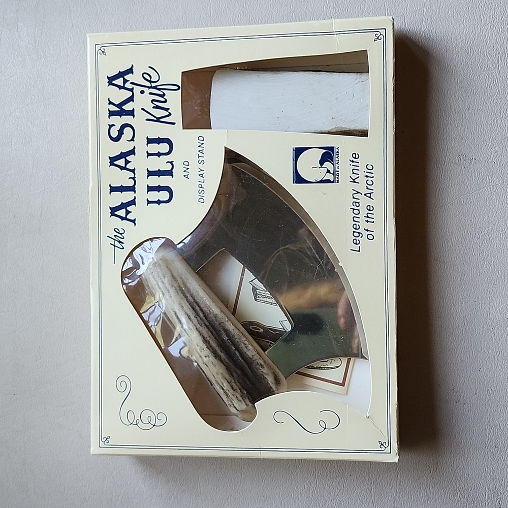 Alaska Ulu knife with display stand. Original made in Anchorage by Ulu Factory